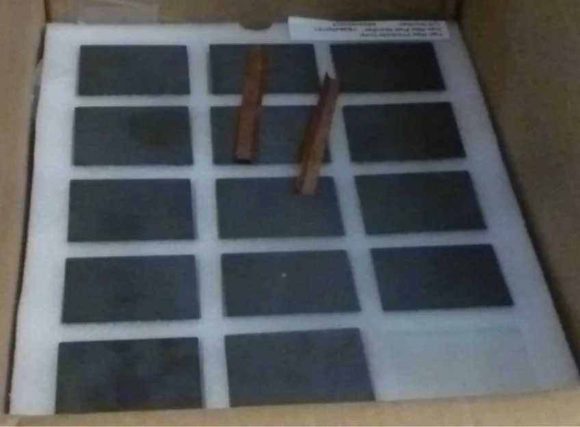 Near Field Dynamics prototype antenna plates arranged on a work surface